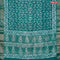 Semi gadwal saree teal green with allover batik prints and zari woven border