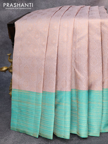 Pure kanjivaram silk saree grey and teal green shade with allover zari woven brocade weaves and zari woven border