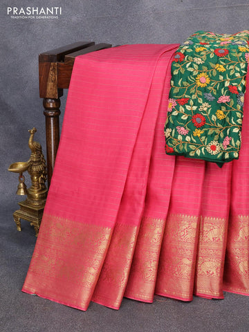Dola silk saree pink shade and green with allover zari woven stripes pattern and long zari woven border with embroidery work blouse