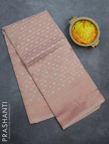 Kota tissue saree peach pink shade with allover zari weaves and zari woven border