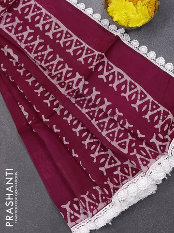 Organza saree dark magenta pink with allover batik prints and crocia lace work border