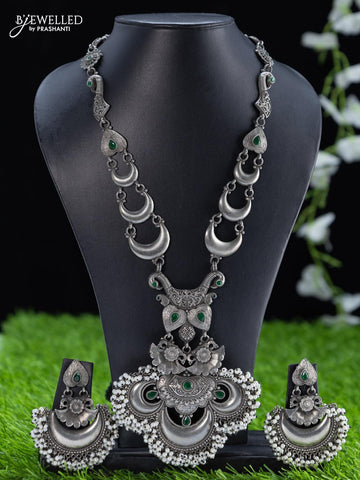 Oxidised haaram with emerald stone and pearl hangings