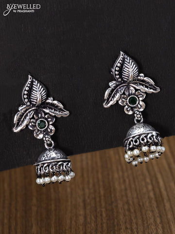 Oxidised jhumka floral & leaf design with emerald stones and pearl hangings