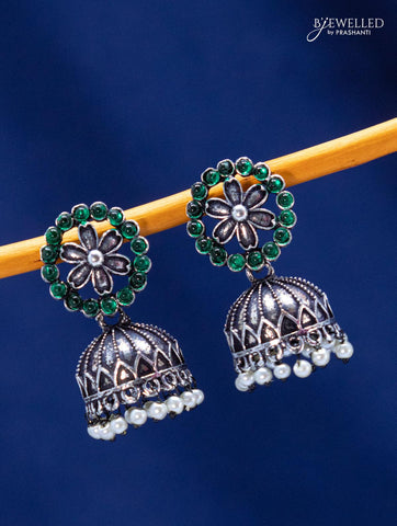 Oxidised jhumka with emerald stones and pearl hangings