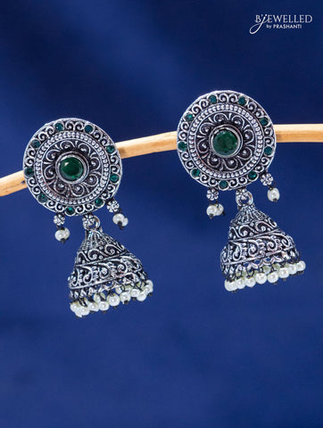 Oxidised jhumka with emerald stones and pearl hangings