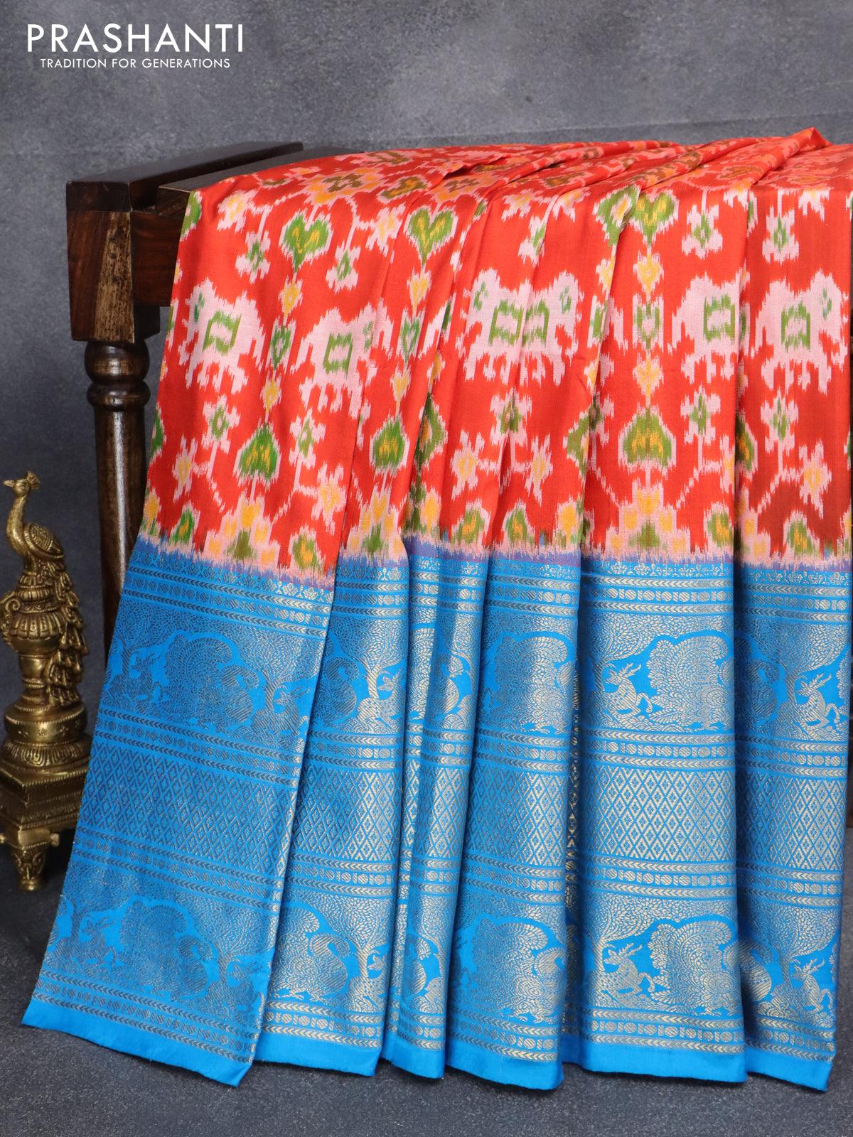 Pochampally silk saree orange and cs blue with allover ikat weaves and long annam zari woven border