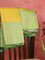 Pure Kanchivaram silk saree yellow and light green with allover floral zari weaves and zari woven border