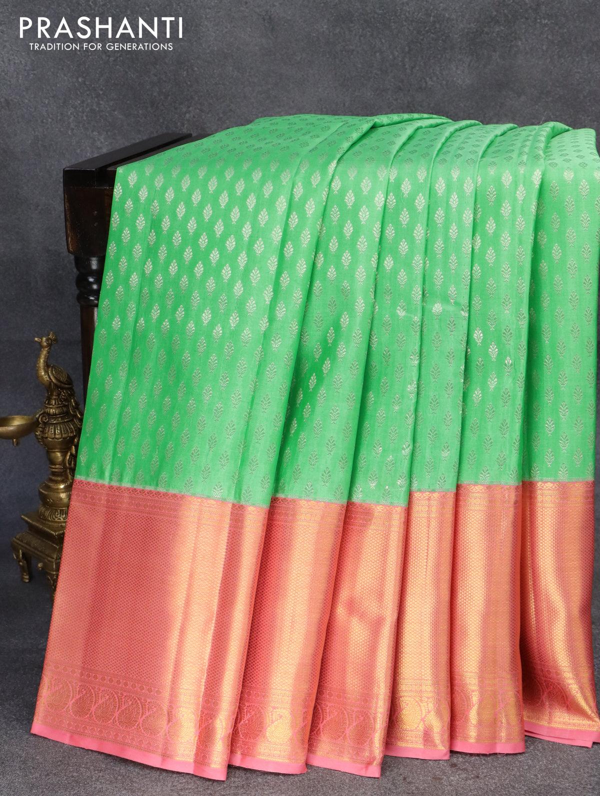 Pure kanjivaram silk saree green shade and light pink with allover silver zari woven butta weaves and long zari woven border