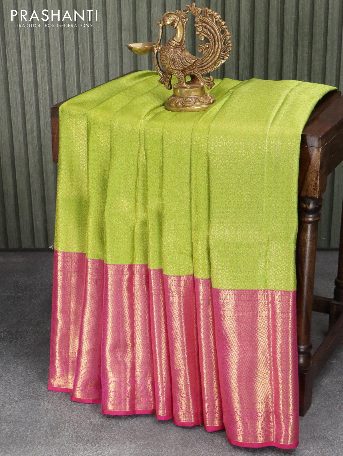 Pure kanjivaram silk saree light green and pink with allover brocade weaves and long rich zari woven border