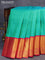 Pure kanjivaram silk saree teal green and pink with allover zari woven butta weaves and long zari woven border