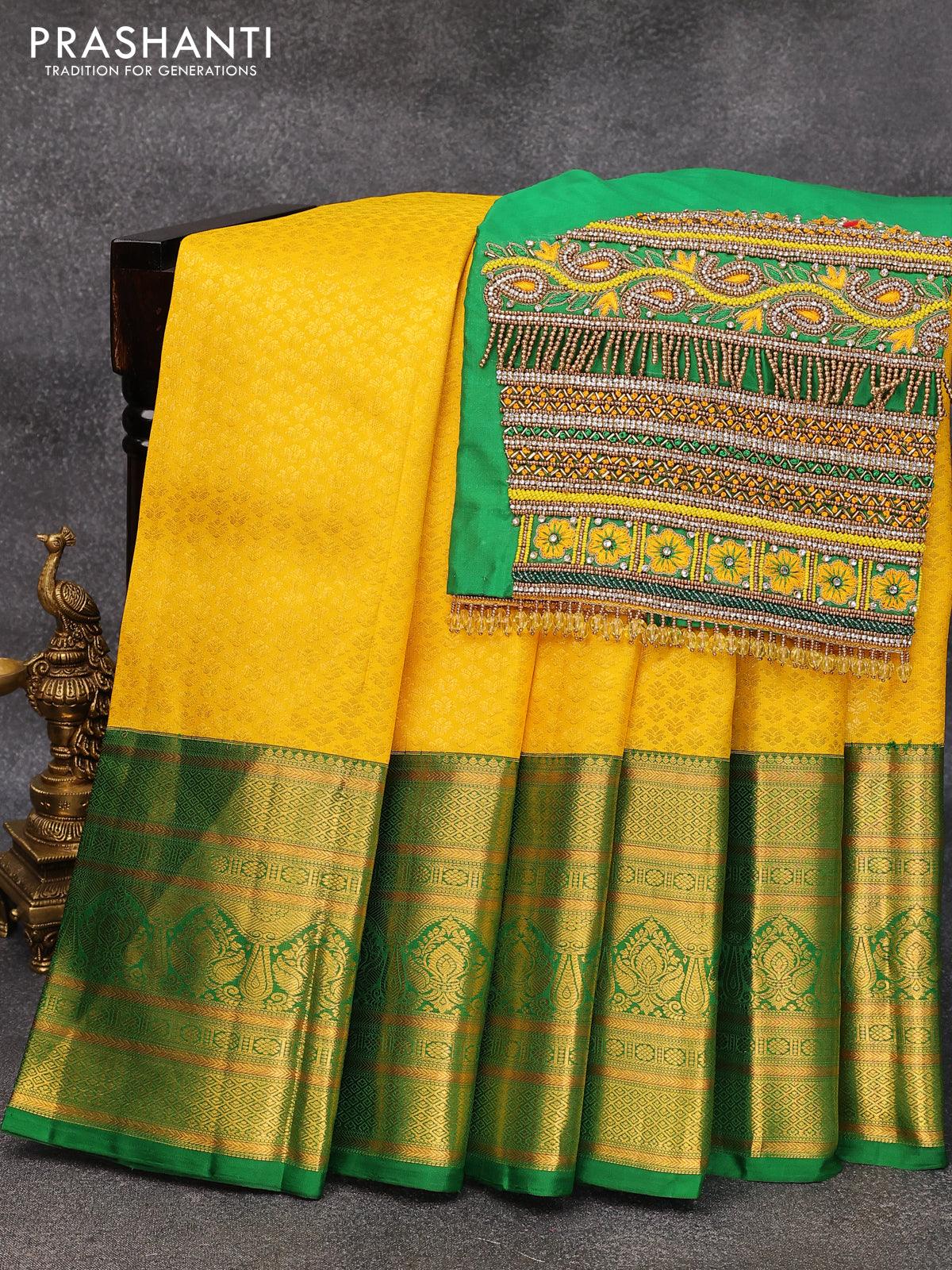 Pure kanjivaram silk saree yellow and green with allover zari woven brocade weaves and long zari woven border & embroidery work blouse