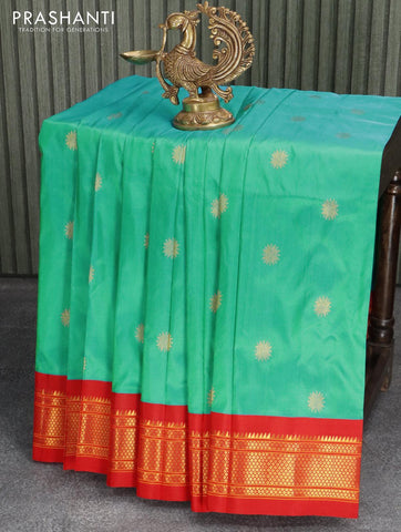 Pure paithani silk saree dual shade of teal bluish green and red with zari woven buttas and zari woven border