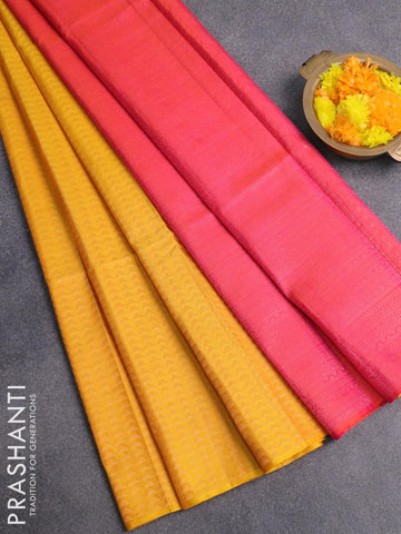 Pure soft silk saree yellow and dual shade of pinkish orange with allover zari woven geometric zari weaves in borderless style