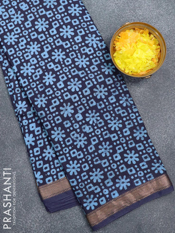 Semi gadwal saree dark blue with allover batik prints and zari woven border