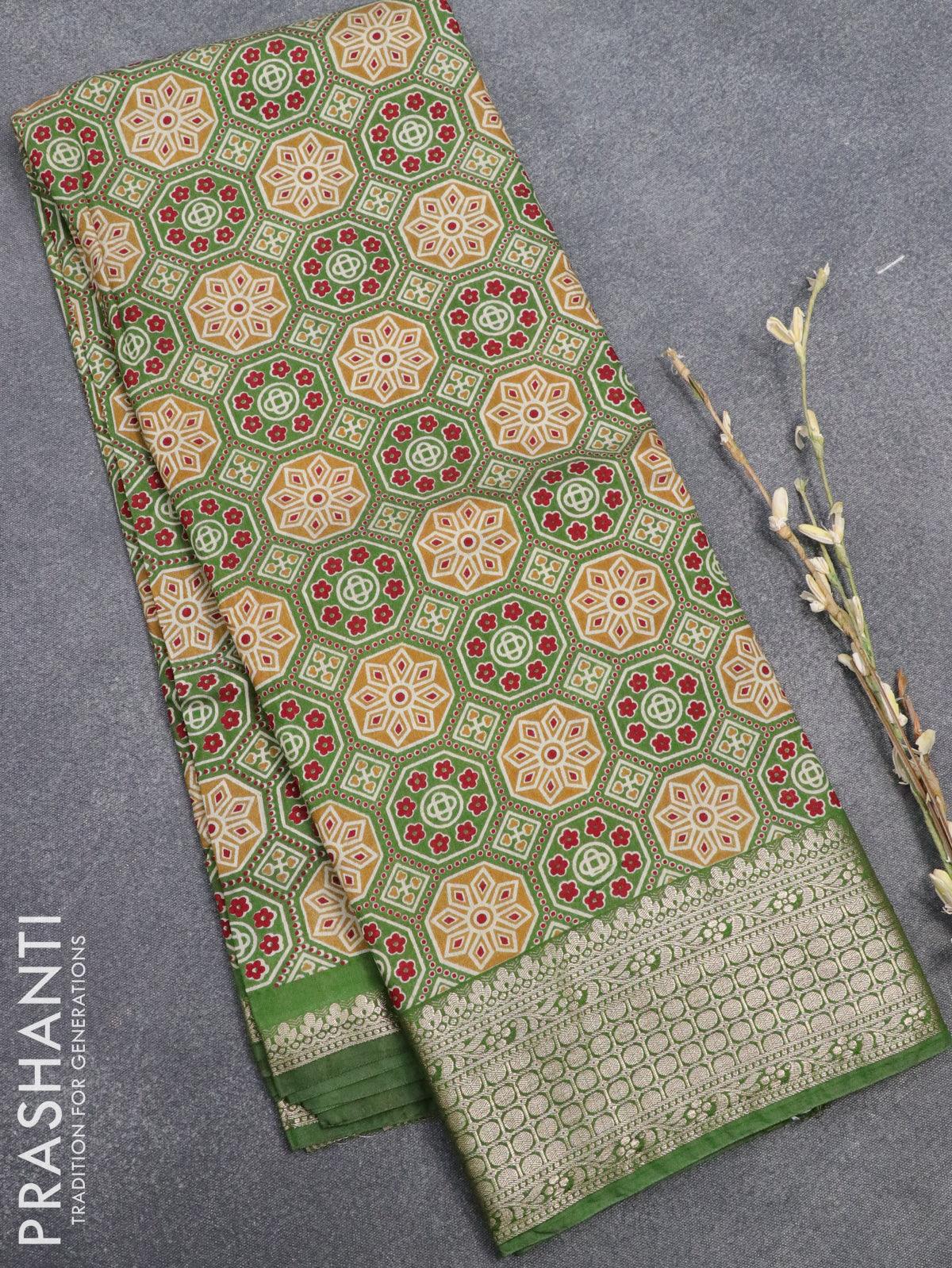 Semi gadwal saree green with allover ajrakh prints and zari woven border
