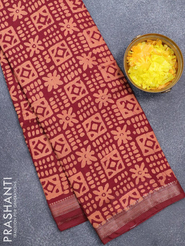 Semi gadwal saree maroon with allover batik prints and zari woven border