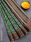 Semi matka saree green and brown with patola prints and zari woven border