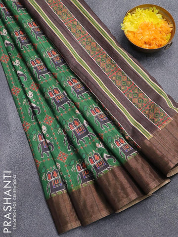 Semi matka saree green and brown with patola prints and zari woven border