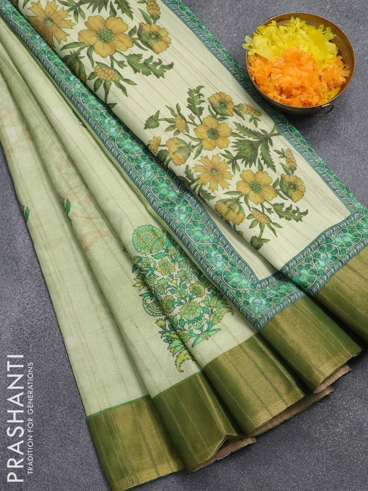 Semi matka saree pista green with floral butta prints and zari woven border
