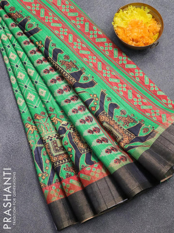 Semi matka saree teal green and red with allover kalamkari prints and zari woven border