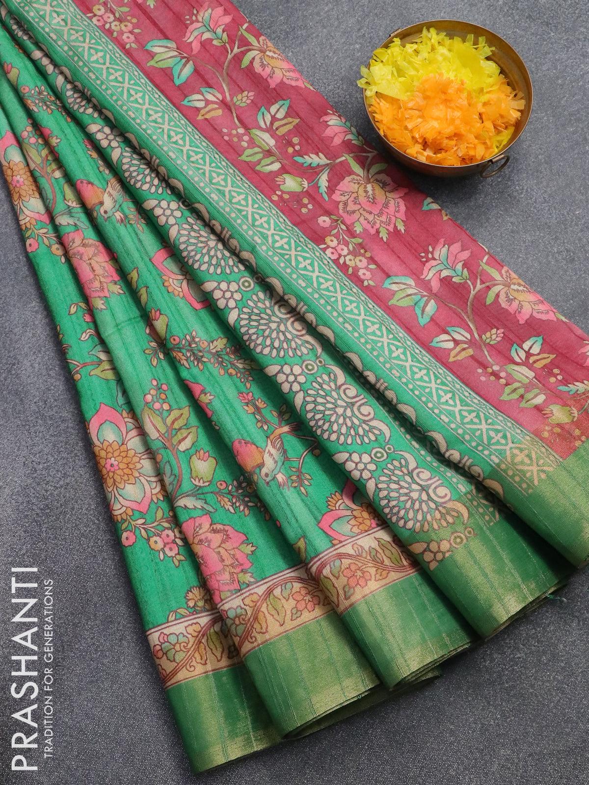 Semi matka saree teal green with allover floral prints and zari woven border