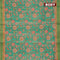 Semi matka saree teal green with allover floral prints and zari woven border