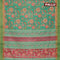 Semi matka saree teal green with allover floral prints and zari woven border