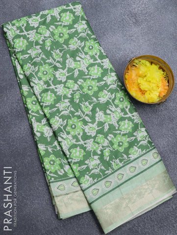 Semi matka silk saree dark green and pastel green with allover prints and zari woven border