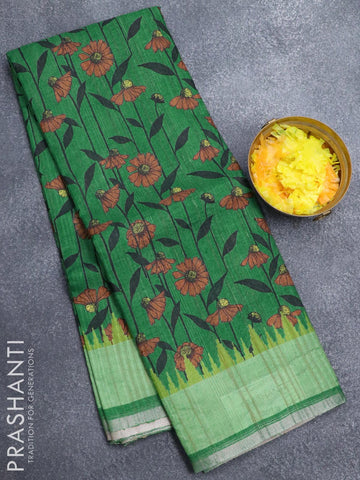 Semi matka silk saree green with allover floral prints and small zari woven border