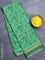Semi matka silk saree green with allover floral prints and small zari woven border