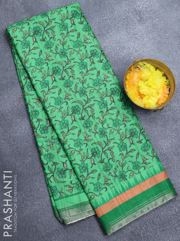 Semi matka silk saree green with allover floral prints and small zari woven border
