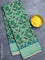 Semi matka silk saree green with allover floral prints and small zari woven border