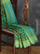 Semi matka silk saree green with allover floral prints and small zari woven border