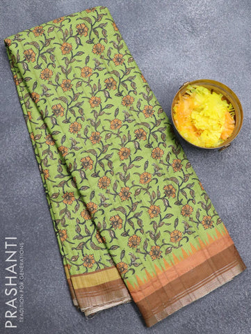 Semi matka silk saree light green and brown with allover floral prints and small zari woven border
