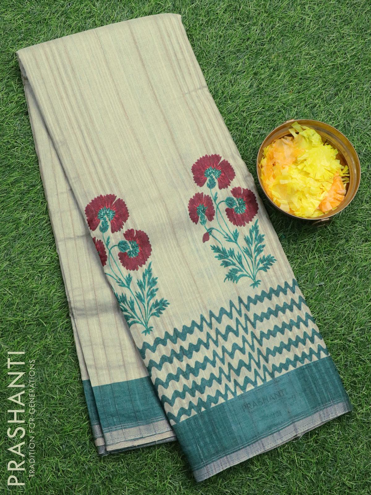 Semi matka silk saree pastel green and green with floral butta prints and zari woven piping border
