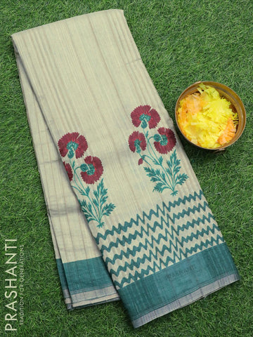 Semi matka silk saree pastel green and green with floral butta prints and zari woven piping border