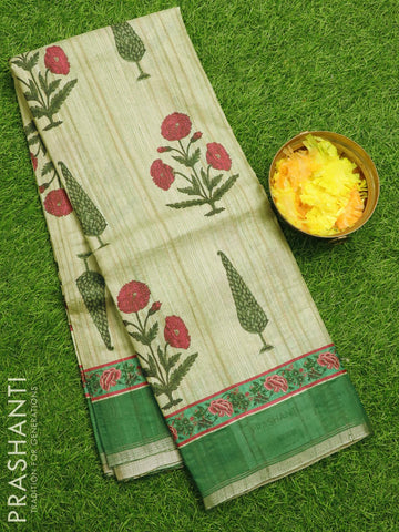 Semi matka silk saree pista green and green with allover floral butta prints and small zari woven border