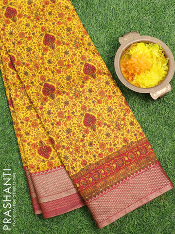 Semi raw silk saree yellow and maroon with allover prints and zari woven border