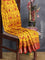 Semi raw silk saree yellow and maroon with allover prints and zari woven border