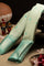 Varamahalakshmi Light Beige & Sea Green Gadwal Buttis Saree